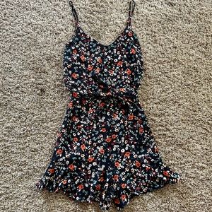 Small Navy Blue Romper with Floral Pattern
